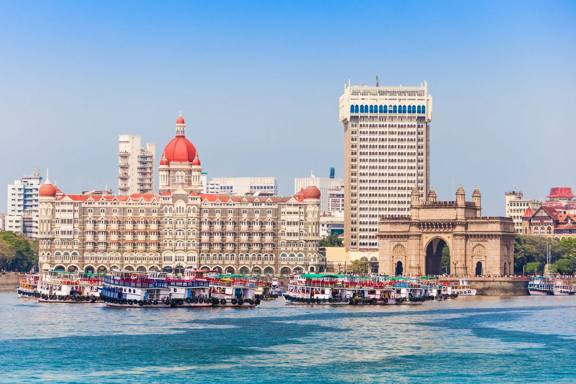 The Gateway of India and the Taj Mahal Palace hotel from the harbour, Mumbai