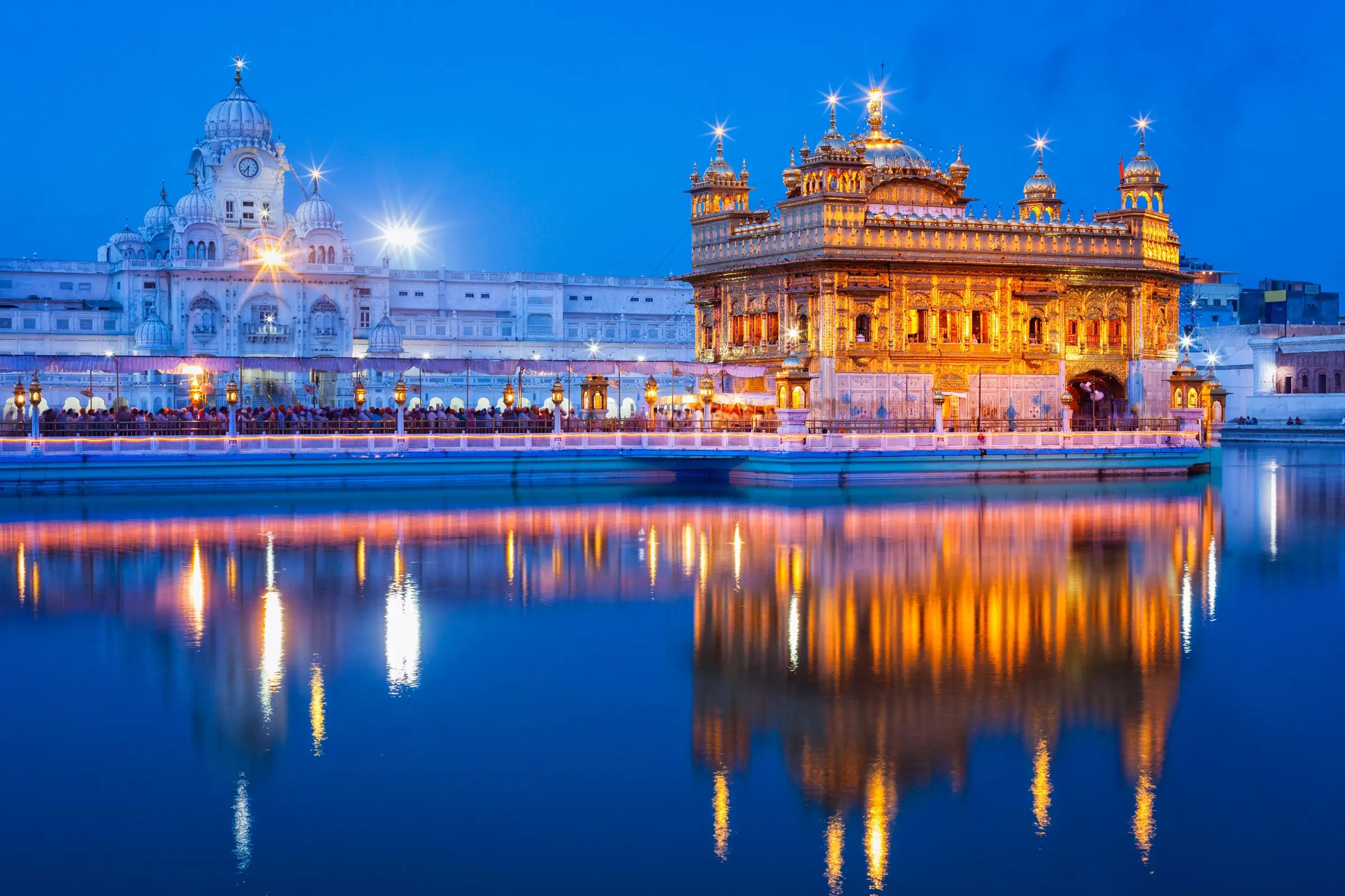 The Golden Temple lit at night and reflected in its sacred pool, Amritsar