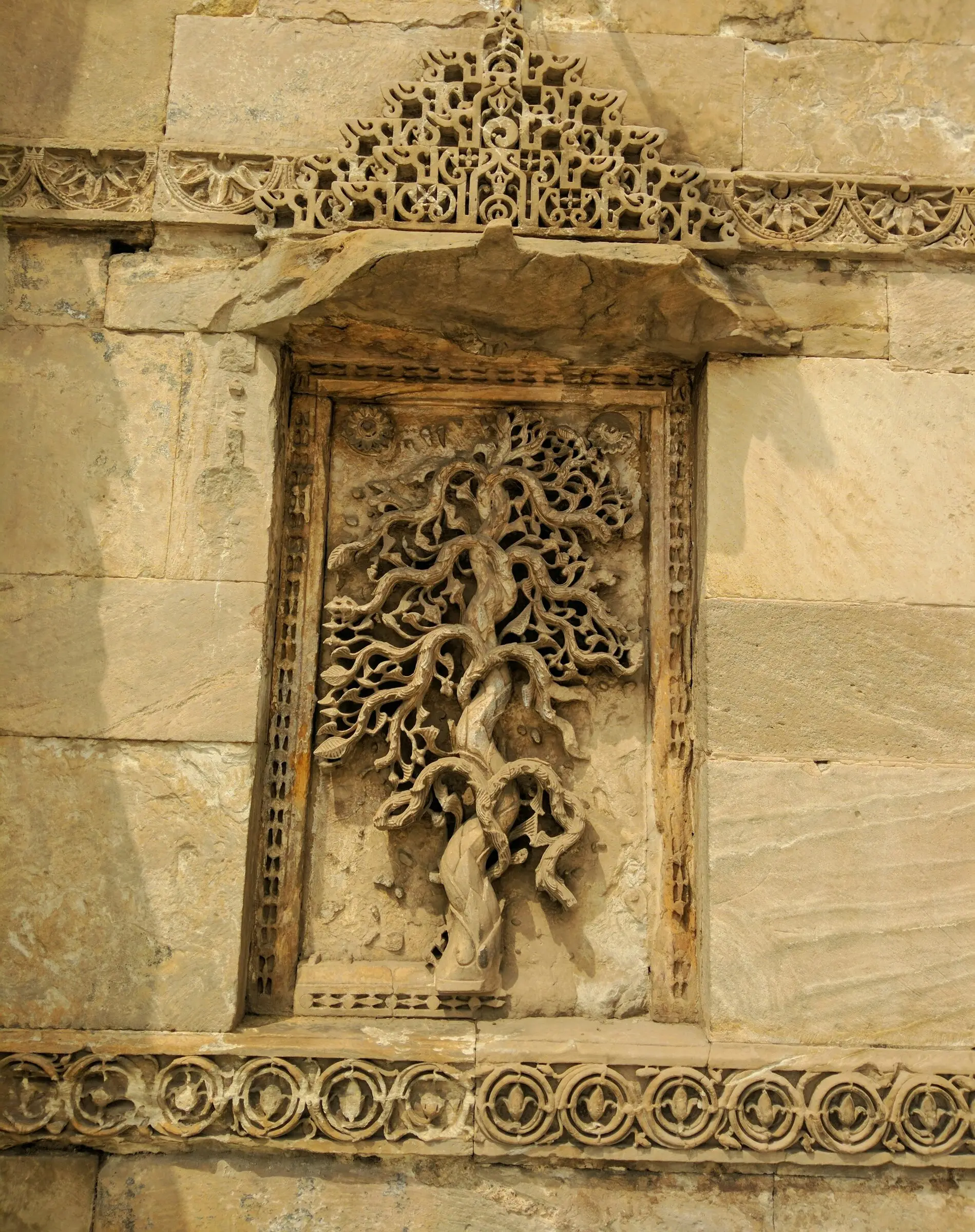 Sunlight through the carved stone lattice of the Sidi Saiyyed jali
